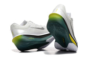 Off-white Nike Zoom Fly 6 shoes showing dark green, yellow, and white outsole details