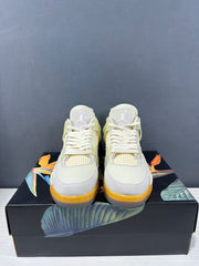 Front view of the pair showing light-colored toe boxes, layered panels, woven mesh sections, and white laces.