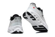 On Cloudmonster 3 shoes showing the heel and outsole