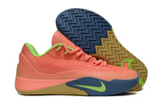 Coral Nike S.T. Flare EP shoe shown beside its patterned dark blue and gum outsole.