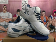 Angled view of two white and navy ASICS Sky Elite FF shoes, showing the side branding, lace-up construction and outsole.