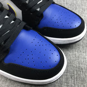 Close-up of the blue perforated toe box with black trim and laces.