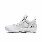 White Air Jordan 34 basketball shoe with subtle pale green details and a translucent sole window.