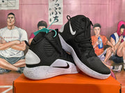 Pair of black and white Nike Hyperdunk basketball shoes shown from multiple angles
