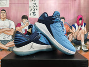 Pair of blue and navy Jordan XXX2 basketball shoes displayed together