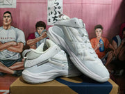 Side view of white and gray ASICS high-top basketball shoes