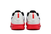 Rear view of the shoes showing red heel details and black collars.