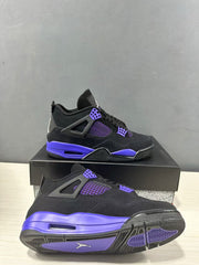 Angled product view showing the side panels, colored outsole sections, and visible midsole air window.