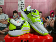 Angled view of the Nike Zoom basketball sneakers showing the lace-up construction, side branding, gray midsole, and neon green outsole.