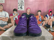 Front view showing the purple uppers, tonal laces, padded collars, and black outsoles.