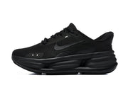 Side view of a black Nike Comfort Ride EasyOn sneaker with a mesh-patterned upper and sculpted sole.
