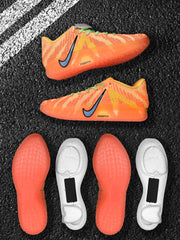 Side view of orange-red Nike sneakers with black-and-blue Swooshes and translucent orange midsoles.