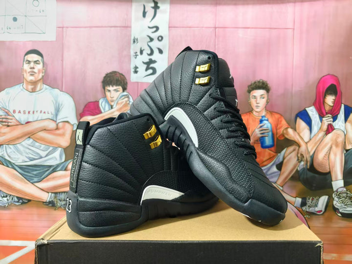 Black high-top Jordan sneaker with white side accents and gold-tone lace hardware, shown at an angle.