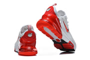 Rear and outsole views of white and red Nike Air Max 270 Premium sneakers.