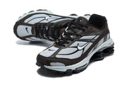 Angled top view of the brown and silver Nike Shox Ride 2 sneakers.