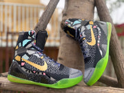 Pair of Nike Kobe 9 All-Star high-top basketball shoes showing patterned uppers and bright green outsoles