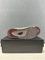 Outsole close-up showing the patterned traction design and visible Nike branding.