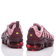 Rear views of the pink Nike TN-18 sneakers with plum heel panels.