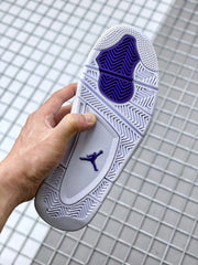 Outsole view showing the white and purple traction pattern and Jordan logo.