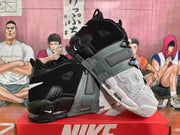 Angled product view highlighting the high-top collar, layered side construction, AIR lettering and contrasting sole.