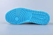 Bottom view showing the blue rubber outsole with circular and grid traction patterns.