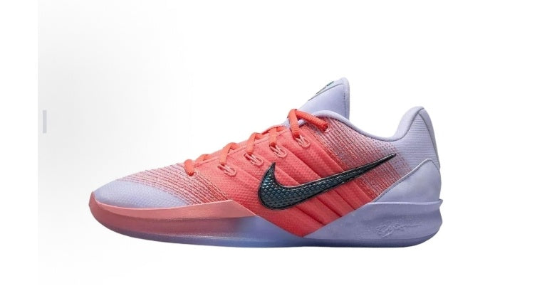 Purple and red Nike lace-up sneaker with a black Swoosh and low-profile sole.