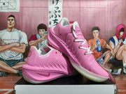 Angled view showing the pink upper, white laces and side Swoosh