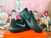 Pair of black Nike basketball shoes with bright blue Swoosh accents, shown from the side and at an angle.