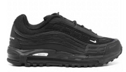 Side profile of a black low-top sneaker with a layered upper and rugged outsole.