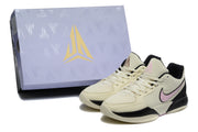 Sneakers displayed beside a Jordan-branded shoe box