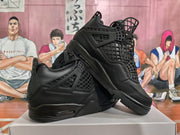 Angled view highlighting the structured grid upper, side support panels, layered midsole, and side air-window detail.