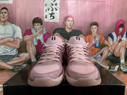 Front view of pink lace-up basketball shoes with patterned toe detailing