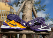 Side and outsole views of gold and purple Kobe 8 shoes