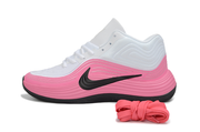 Side profile of a white and pink Nike basketball sneaker with layered wave detailing.