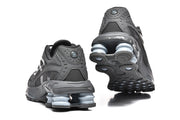 Rear and outsole views of dark grey Nike Shox Ride 2 sneakers
