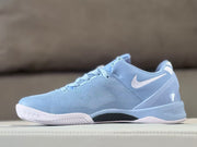 Opposite side view showing the light blue upper and white accents