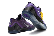 Purple and black shoes shown from the heel and outsole.