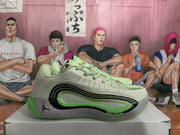 Side profile of a mint green Jordan basketball sneaker showing layered black side detailing, a speckled gray section, Jumpman branding, and Cushlon text.