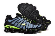 Nike Shox TL sneakers shown from the side and underside, highlighting the patterned outsole.