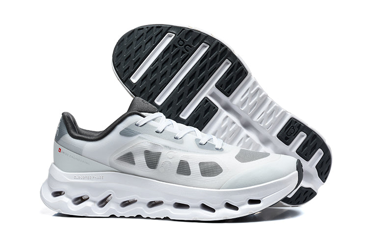 White and grey Cloudtilt Remix sneaker shown beside its patterned outsole.