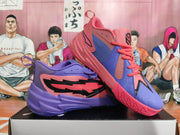 Angled view of pink and purple basketball sneakers showing the color-blocked uppers and sculpted soles