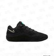 Opposite side profile of a black Nike KD 18 basketball sneaker with a light-colored Swoosh, textured upper panels, and green tongue branding.