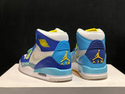 Rear view showing contrasting blue heel panels, Jordan graphics, and yellow accents.