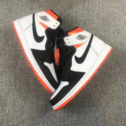 Top-down view of the pair showing black, white, and orange paneling.