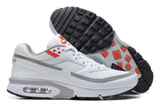 Nike Air Max sneakers showing the black tread outsole and side cushioning window
