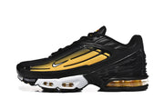 Side view of a black and yellow Nike Air Max Plus III sneaker.