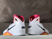Rear view of the pair showing black Nike heel lettering and red collar lining.