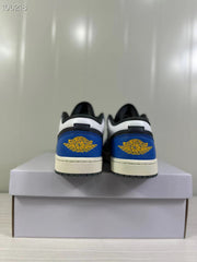 Rear view showing blue heel panels with yellow winged branding.