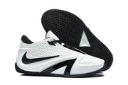 Side view of the shoes with one shoe turned to show its patterned outsole.