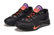 Pair of black Nike S.T. Flare EP shoes with orange and purple details.